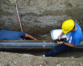 Macroscopic description and sampling of coarse-grained channel deposits and fine-grained overbank deposits of the Lombach fan delta (Berner Oberland, Switzerland; 09.09.2007, © by M. Oliva)